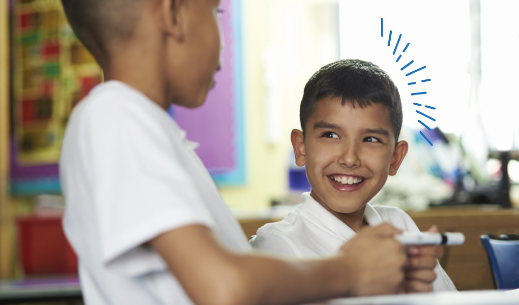 Primary school child happy in class